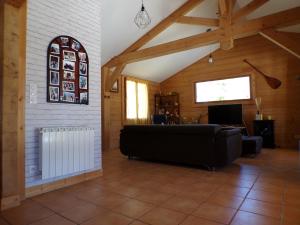 Maisons de vacances Maison en bois, piscine privee chauffee : photos des chambres
