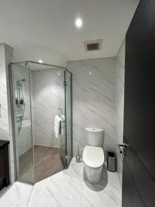 1BR Branz BSD: PS5, King Size Bed, and 4K OLED TV