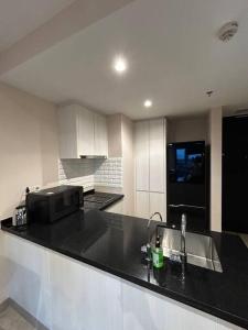 1BR Branz BSD: PS5, King Size Bed, and 4K OLED TV