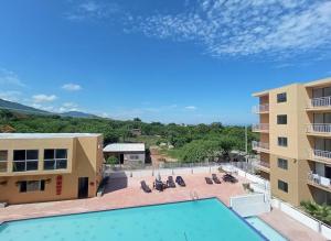 Atardecer Samario Portal de la Sierra Santa Marta Magdalena Colombia Apartamento Piscina vista mar Bello Horizonte 3 habitaciones