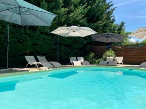 B&B / Chambres d'hotes La Clef des Songes B&B de charme - Sarlat Centre - Parking gratuit - Piscine et espace bien-etre a 400metres : photos des chambres