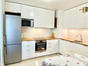 Appartements Triplex neuf avec toit-terrasse au pied du Metro - 10min PARIS EXPO - 4 rooms 6 beds : photos des chambres