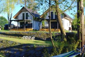 Brama Sanu - z prywatną linią brzegową Jeziora Solińskiego - pomosty - pontony - basen sezonowy