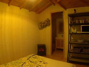 B&B / Chambres d'hotes Cabane Perchee dans la prairie de l'ancien moulin : photos des chambres