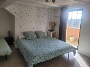 Maisons de vacances Petite maison au coeur des vignes : photos des chambres