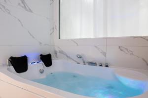 Appartements News ! Loft Movie Station Champagne : photos des chambres