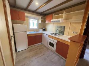 Campings Camping le Convivial Cottage climatise 6-8 personnes : photos des chambres