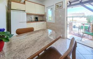 Gorgeous Apartment In Medulin With Kitchen