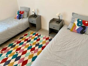 Appartements Appartement Cosy Rez de jardin : photos des chambres