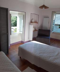 Maisons de vacances La Calmille Maison avec Jardin : photos des chambres