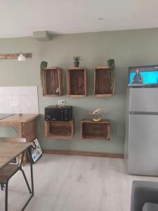 Appt bord de mer rez de jardin