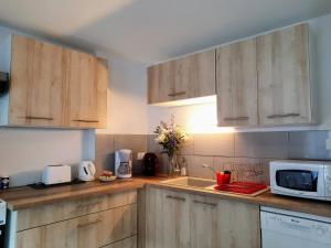 Appartements Le createur - Au coeur de la Ville Haute : photos des chambres