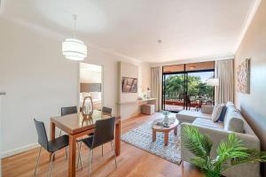 Two Adjacent King Suites with a Breezy Balcony