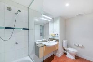 Two Adjacent King Suites with a Breezy Balcony