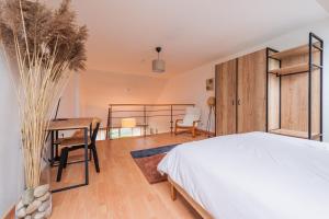 Appartements Le Cerisier - Bel Appt pour 4 personnes : photos des chambres