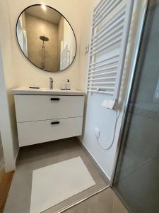 Appartements Appartement cosy a 1 min de Paris : photos des chambres