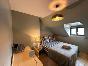 Appartements Cosy Apartment in City Center : photos des chambres