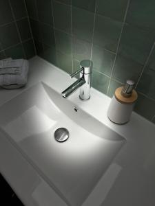 Appartements Cosy Apartment in City Center : photos des chambres