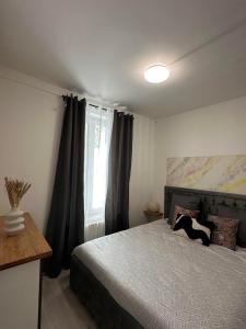 Appartements Cosy House a 9 mins RER A et 35 mins de Paris : photos des chambres