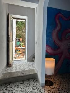 La casa del polpo rosa