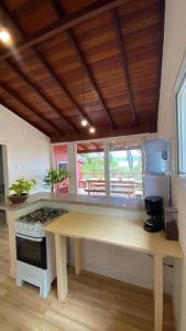 Casa charmosa na mata com vista da lagoa.