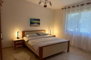 Shtepia nen Pisha "The House under the Pines"