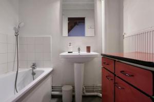 Appartements Maisonnette atypique dans le vieux Lille : photos des chambres