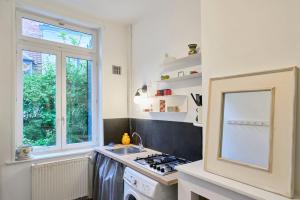 Appartements Maisonnette atypique dans le vieux Lille : photos des chambres