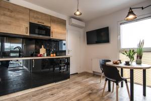 Monkey - 77 Apartments Wigury - Dostęp na KOD - Parking - Smaczna Kawa - Centrum - Blisko Piotrkowska - Galeria - Widok na miasto - Klimatyzacja - 7 piętro - FV