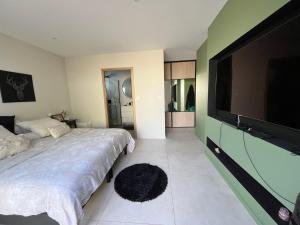 Villas La Villa Guinguette et son jacuzzi : photos des chambres