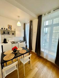 Appartements Le clair de lune - hyper centre : photos des chambres