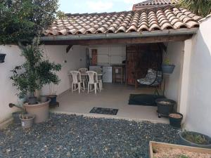 Maisons de vacances Petite maison de ville : photos des chambres