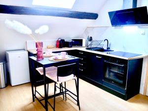 Appartements Oasis Love : photos des chambres