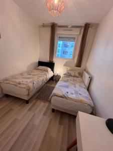 Appt à 10 min de Paris, 15 min a pied du SDF