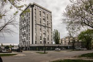 Monkey - 77 Apartments Wigury - Dostęp na KOD - Parking - Smaczna Kawa - Centrum - Blisko Piotrkowska - Galeria - Widok na miasto - Klimatyzacja - 7 piętro - FV