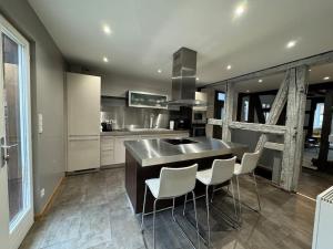 Maisons de vacances La Maison de l-Ours - Avec Patio & Garage - 8 personnes : photos des chambres