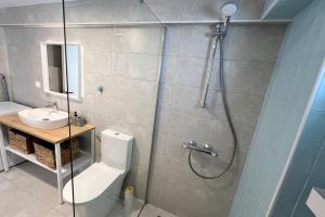 Minimalist Seaside Apartment with Private Patio and Parking - Blue Zone Homes