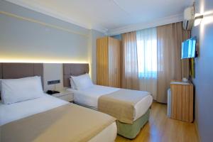 Standard Triple Room room in Grand Ant Hotel