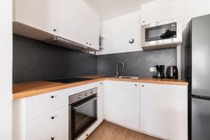 Appartements Appartement Cosy avec terrasse aux portes de Paris : photos des chambres