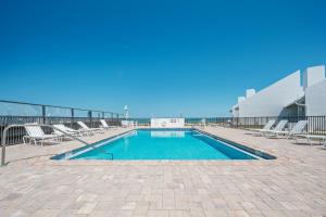 Enjoy the balcony with an ocean view located on the no-drive beach!