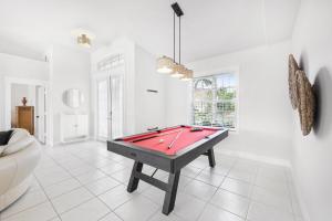 Waterfront home with pool table, heated pool and dock