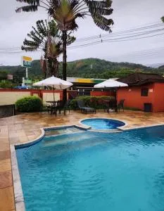 Flat em Juquehy - Condomínio com portaria e com piscina próximo praia - Praia de Juquehy
