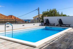 Holiday house with a swimming pool Pakostane, Biograd - 22480