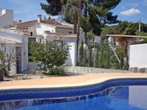 Casa clásica con piscina comunal, jardín y cerca de la playa en Moraira para 6 personas - HISP-216-212