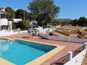 Acogedora casa en Moraira con piscina comunitaria, cerca de la playa, ideal para familias y amigos - HISP-216-222