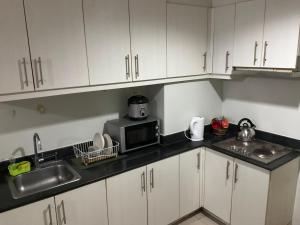 SEA 2-BR Unit with Free Parking near Mall of Asia