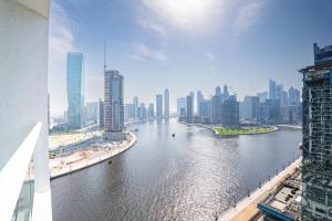 Escape24 Stylish 2BR Apartment at Damac Maison Privé, Business Bay with Canal View