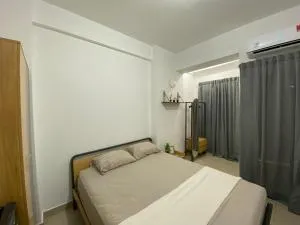 Minimalist room at The Nest Apartment by Popobella Near Puri Indah West Jakarta - Bulak 2