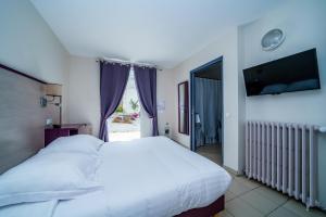 Hotels Logis Le Grand Hotel : photos des chambres