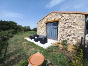 Maisons de vacances Au detour du Puy Maison avec piscine interieure a 15 mn Puy du Fou : photos des chambres